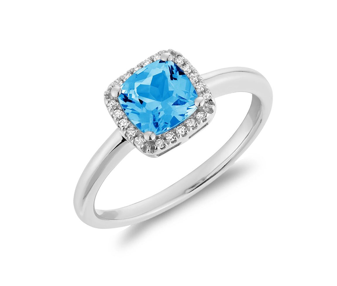 BAGUE EN OR BLANC SERTIE D'UN TOPAZE BLEU ET DE DIAMANTS - BR 02041028BT - Bijoux d'importation BAGUE EN OR BLANC SERTIE D'UN TOPAZE BLEU ET DE DIAMANTS - BR 02041028BT - Bijoux d'importation