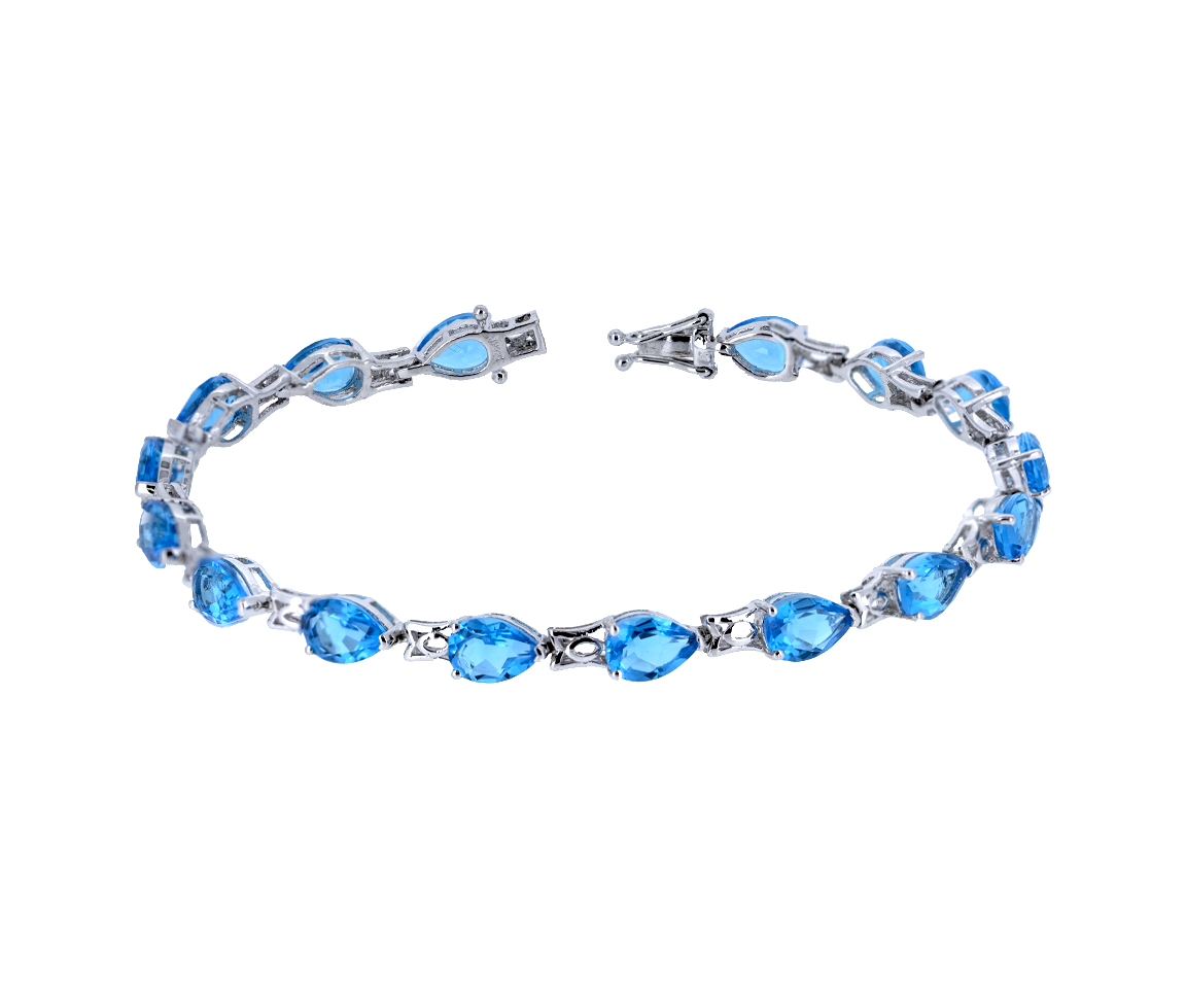 BRACELET EN ARGENT RHODIÉ SERTI DE TOPAZES BLEUS BRACELET EN ARGENT RHODIÉ SERTI DE TOPAZES BLEUS