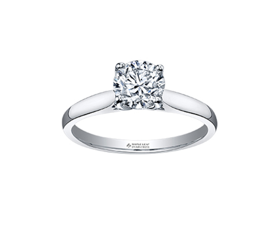 BAGUE EN PLATINE AVEC UN DIAMANT CANADIEN BAGUE EN PLATINE AVEC UN DIAMANT CANADIEN