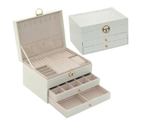 COFFRE À BIJOUX EN CUIR CAPITONNÉ - SJ COPU/BC - BIJOUTERIE SUISSE INC.