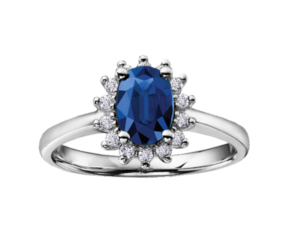 BAGUE EN OR BLANC SERTIE DE DIAMANTS ET D'UN SAPHIR