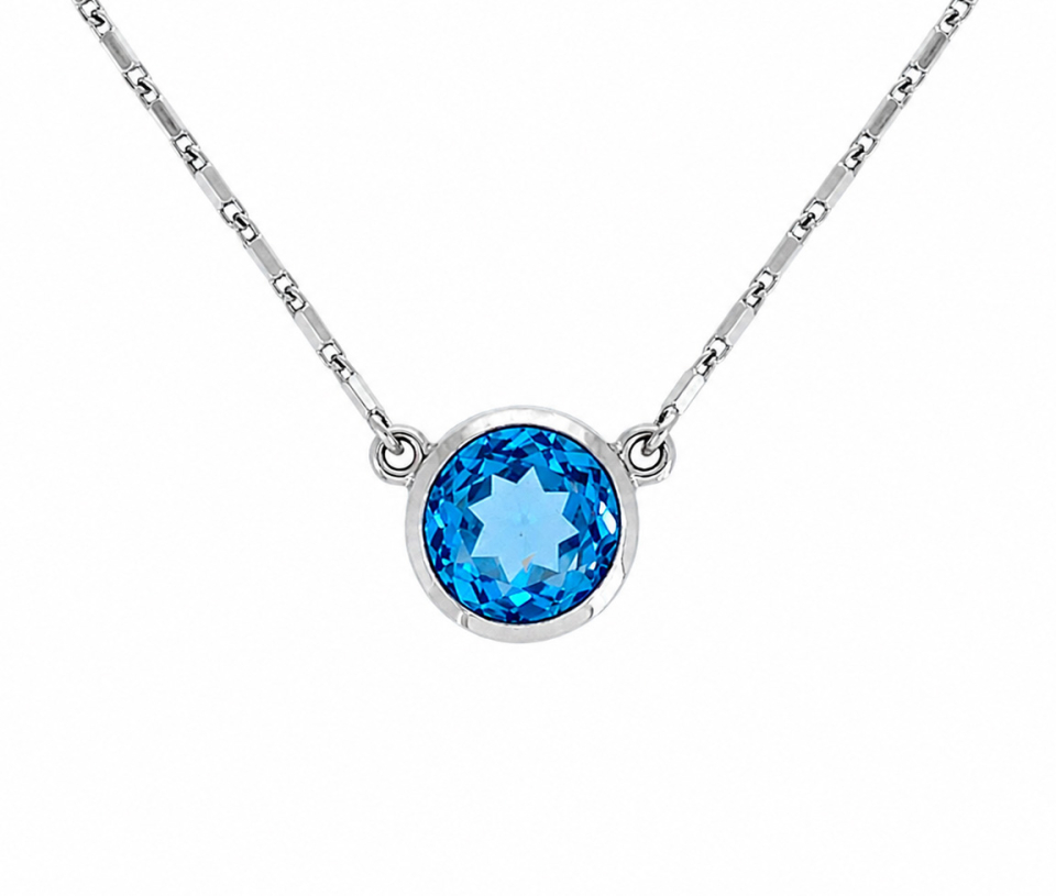 COLLIER AVEC UNE TOPAZE BLEUE
